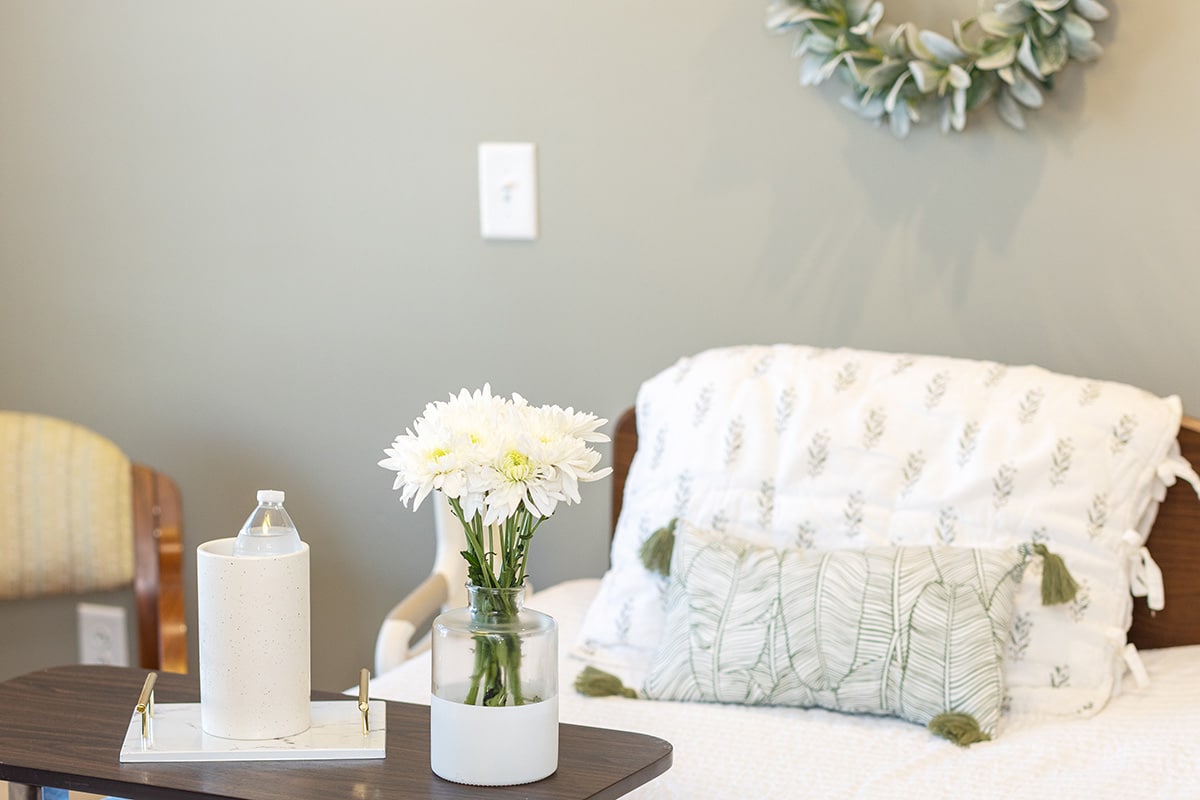 Cozy seating and decor in a private room at Anchor Post Acute.